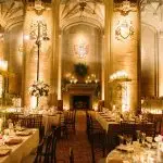 Reception Tables at University Club in Chicago showcasing various centerpiece heights, tall short and extra tall.